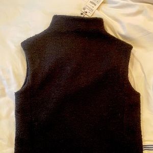 Black mock neck turtleneck sleeveless sweater. BRAND NEW WITH TAGS.